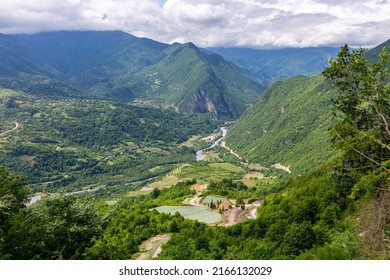 Tskhenistsqali River Valley Landscape In Racha Region Of Georgia With Svaneti Mountain Range, Lush Green Forests And Vineyards Seen From To Khvamli Mountain.