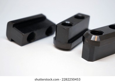 T-slot nut , T-nut jaw of CNC lathe,cnc machining center or milling and other machine for metalwork industrial                                 - Shutterstock ID 2282250453