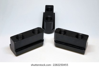 T-slot nut , T-nut jaw of CNC lathe,cnc machining center or milling and other machine for metalwork industrial                                 - Shutterstock ID 2282250455