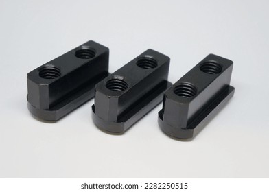 T-slot nut , T-nut jaw of CNC lathe,cnc machining center or milling and other machine for metalwork industrial                                 - Shutterstock ID 2282250515