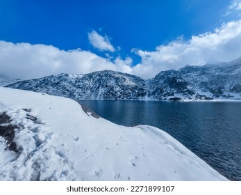 Tsomgo Lake, also known as Tsongmo Lake or Changgu Lake, is a glacial lake in the East Sikkim district of the Indian state of Sikkim, some 40 kilometres (25 mi) from the capital Gangtok. Located at an