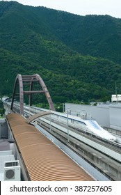 TSURU, JAPAN - JULY 23, 2015: A Shinkansen L0 Series Rides A Test Run On Yamanashi Maglev Test Line. This Train Reached A World Speed Record At 603 Km/h In 2015.