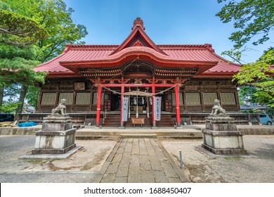 Tsuruoka, Yamagata, Japan - August 3, 2019 : Gardens and Main Hall of Sanno Hie Jinja Shinto shrine.