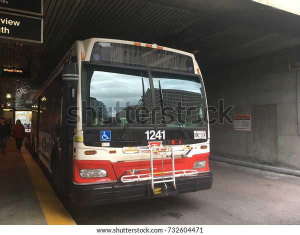 TTC Bus At Davisville Subway Station, TTC Bus Stop\
At Train Station in Toronto, Waiting For Passengers / People -\
Octover 11 2017