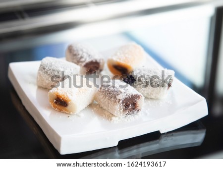'Tteok' is a class of Korean rice cakes made with steamed flour made of various grains, including glutinous or non-glutinous rice. Tteok is enjoyed as a dessert or a meal.