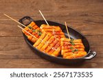 Tteok kochi is tteokbokki that is skewered so it looks like satay