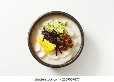  tteokguk, rice-cake soup (prepared with slices of rice cake, beef, eggs, etc.) - Shutterstock ID 2169057877