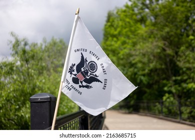 Tualatin, OR, USA - May 30, 2022: United States Coast Guard Flag Is Seen Alongside American Flags On A Pedestrian Bridge In Tualatin Community Park In Tualatin, Oregon, On Memorial Day.