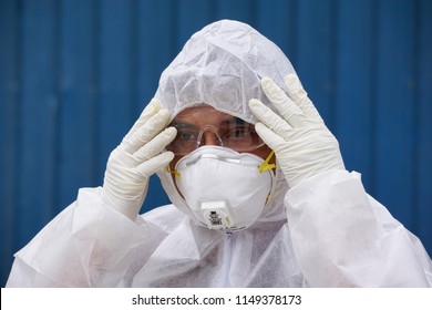 Tuaran Sabah Malaysia - Aug 4, 2018 : Veterinary Worker Wearing Personal Protection Equipment (PPE) During Avian Influenza (bird Flu) Checking On Chicken Barn In Tuaran Sabah. 