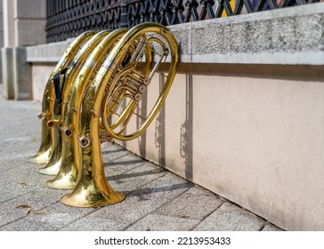 Tuba musical brass instruments standing on the ground. - Shutterstock ID 2213953433