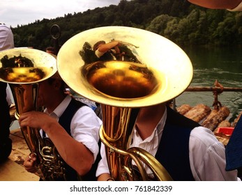 Tuba player at bavarian brass band during a tour at Munich.