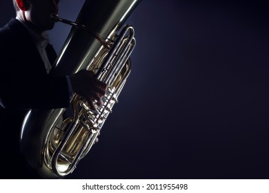Tuba player brass instrument. Hands playing euphonium. Wind instruments closeup