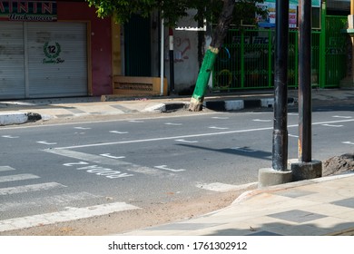 Tuban, Indonesia - June 22 2020: New Normal, Social Distancing Lines On Traffic Lights That Resemble The Starting Grid Of Moto GP