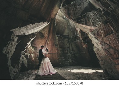 Tuban, INDONESIA - Maret 09, 2017: Wedding Couple On The Goa Suci Cave, Tuban, Indonesia.