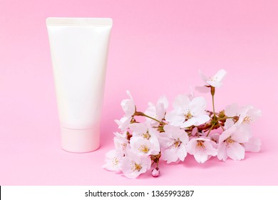 Tube with cream on a pink background, front view, cosmetics care concept - Shutterstock ID 1365993287