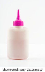 A Tube Of Lubricant On A White Background. Space For Text. Vertical Snapshot