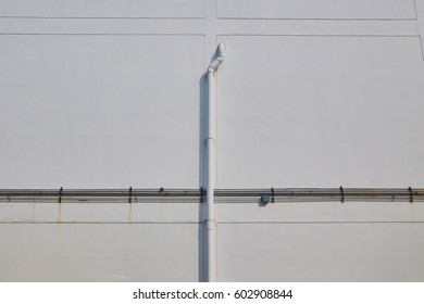 Tube on white wall - Shutterstock ID 602908844