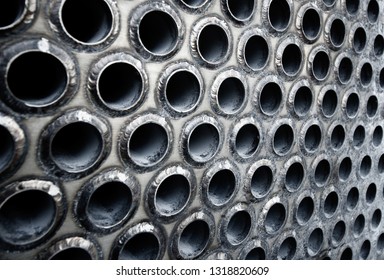 Tube Sheet Of The Heat Exchanger For Maintenance, The Water Heater In The Boiler As Background