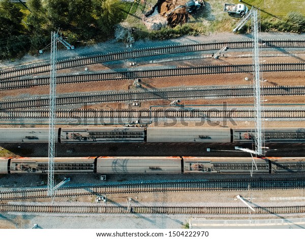 tube train depot. Aerial drone photo looking\
down, Diesel Engine train. Top\
view.