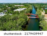 Tubing the Boise River in summer with red bridge