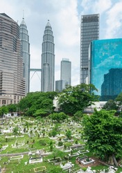 Tucked Away Off Jln Ampang And Split From Kampung Baru By A Highway Is One Of KL's Oldest Muslim Burial Grounds. It's Shaded By Giant Banyans And Rain Trees.