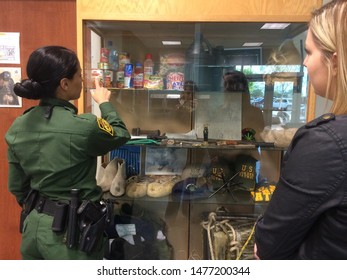 Tucson, Ariz. / US - March 4, 2015: A Reporter Interviews An Agent At The US Customs And Border Protection Tucson Sector Headquarters. 2574