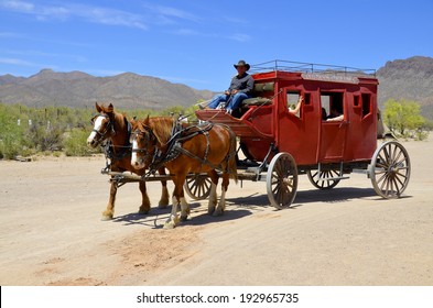 TUCSON ARIZONA APRIL 24: A vintage stagecoach at Old Tucson on april 24 2014 in Tucson Arizona. A stagecoach is a type of covered wagon used to carry passengers and goods inside.