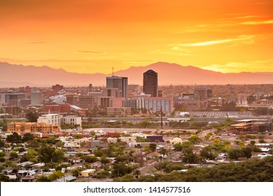 Tucson, Arizona, USA downtown city skyline with mountains at twilight.