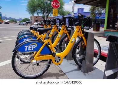 Tucson, Arizona USA - July 23, 2019: Tugo Bike Share Rental Program Bicycles In A Docking Station On 4th Ave