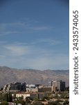 Tucson, Arizona, USA - May 28, 2022: Afternoon sun shines the North University skyline and the University of Arizona.