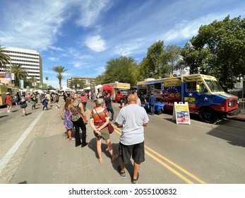 Tucson, Arizona, USA - October 8, 2021. Food trucks lined up for hungry diners at the Tucson Meet Yourself Festival. 