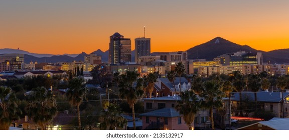 Tucson, AZ - March 9 2022: Tucson Skyline With Mountain Adorned With A In The Background