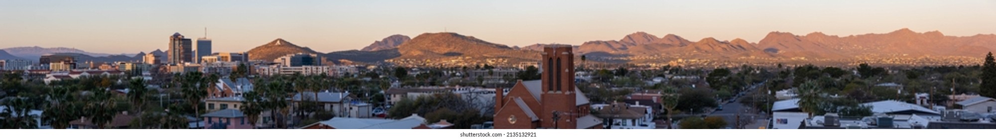 Tucson, AZ - March 9 2022: Tucson Skyline With Mountain Adorned With A In The Background