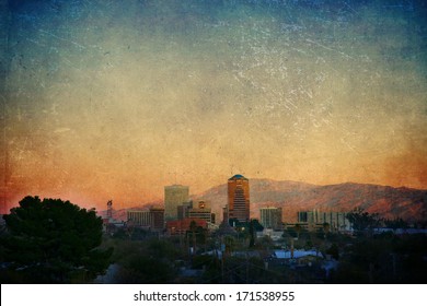 Tucson cityscape at sunset with a texture overlay