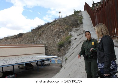 Tucson Sector, Ariz. / US - March 4, 2015: A reporter interviews a Customs and Border Protection agent along the U.S.-Mexico border. 4589