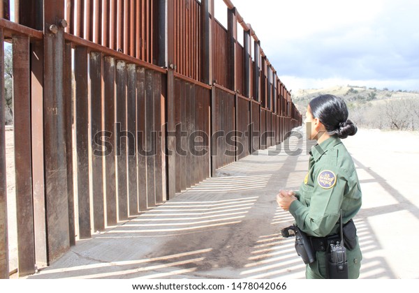 Tucson Sector,\
Ariz. / US - March 4, 2015: A Customs and Border Protection agent\
along the U.S.-Mexico border.\
4384
