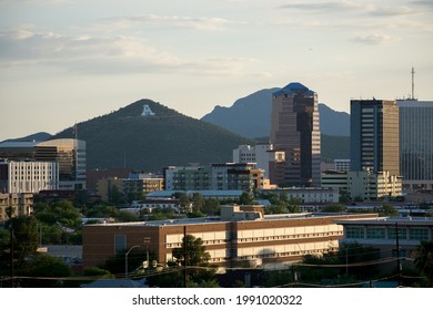 TUCSON, UNITED STATES - Jul 28, 2017: Downtown Tucson AZ Skyline From The University Of Arizona Campus, Featuring 'A' Mountain And The Bank Of America Building Just Before Sunset 