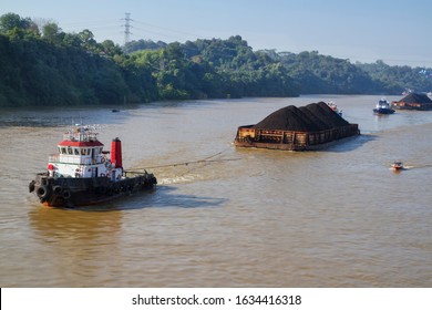 Tug Boat Pulling Coal Barge On Mahakam River, Samarinda