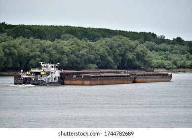 Tug Boat Pushing Barges On The Danube River