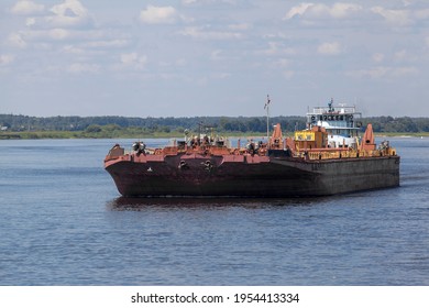 A Tug Carrying A Liquid Barge On The Volga River