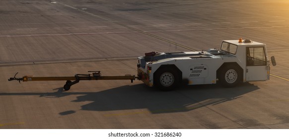 TUG Pushback Tractor In The Airport.