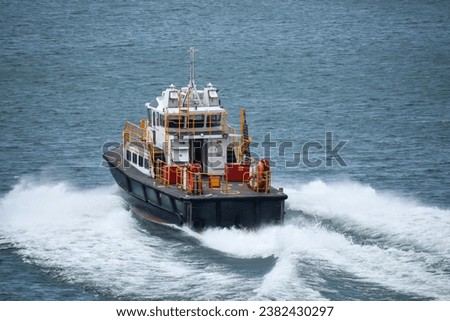 Tugboat sailing in the open sea