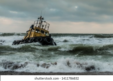 Tugboat Thrown Ashore During A Winter Storm