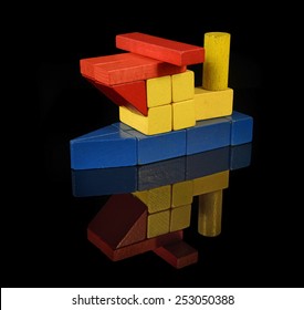 Tugboat Of Wooden Blocks, Traditional Toy On Black Background