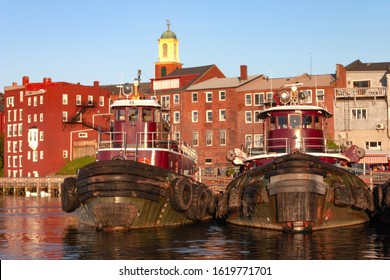 Tugboats waiting for their duties while being docked in Portsmouth, New Hampshire.