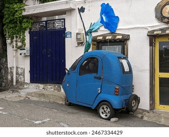Tuk tuk with a mural