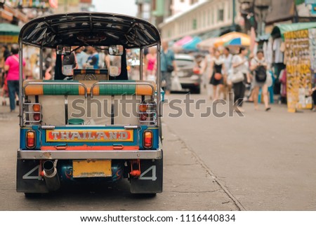 Tuk Tuk (Thai traditional taxi car) parking for wait a tourist passenger at famous backpacker street in Bangkok (Khao San road), landmark and popular for tourist , sightseeing in Bangkok, Thailand