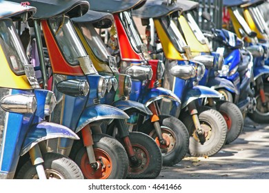 Tuk Tuks Lined Up In A Side Ally In Bangkok