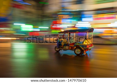 Tuk-tuk in motion blur, Bangkok, Thailand
