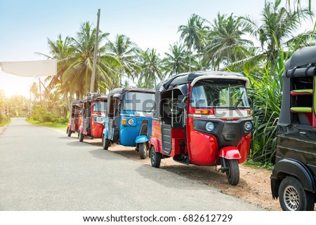 Tuktuk taxi on road of Sri Lanka Ceylon travel car